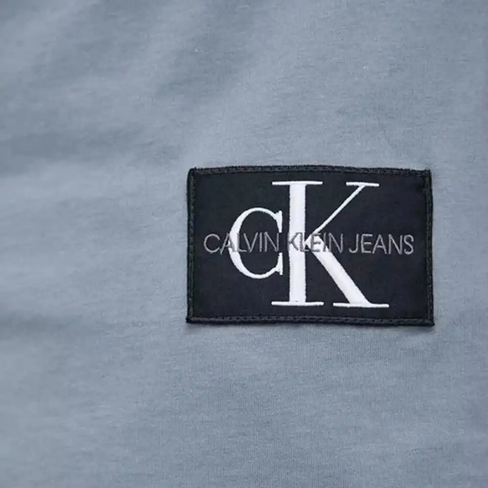 Badge Turn Up Calvin Klein - 2 Badge Turn Up Calvin Klein - 2