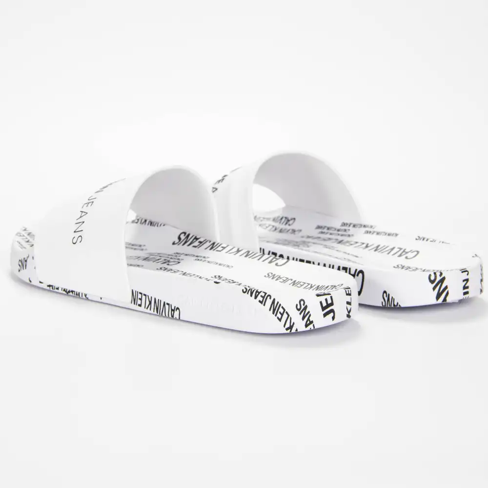 Claquette homme Calvin Klein slide institutional Blanc - ZESHOES Claquette homme Calvin Klein slide institutional Blanc - ZESHOES