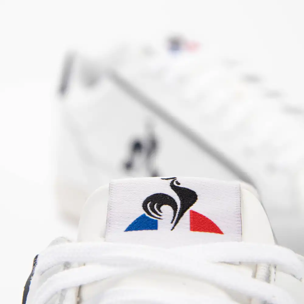 Basket de ville basse homme Le Coq Sportif Tournament Blanc - ZESHOES Basket de ville basse homme Le Coq Sportif Tournament Blanc - ZESHOES