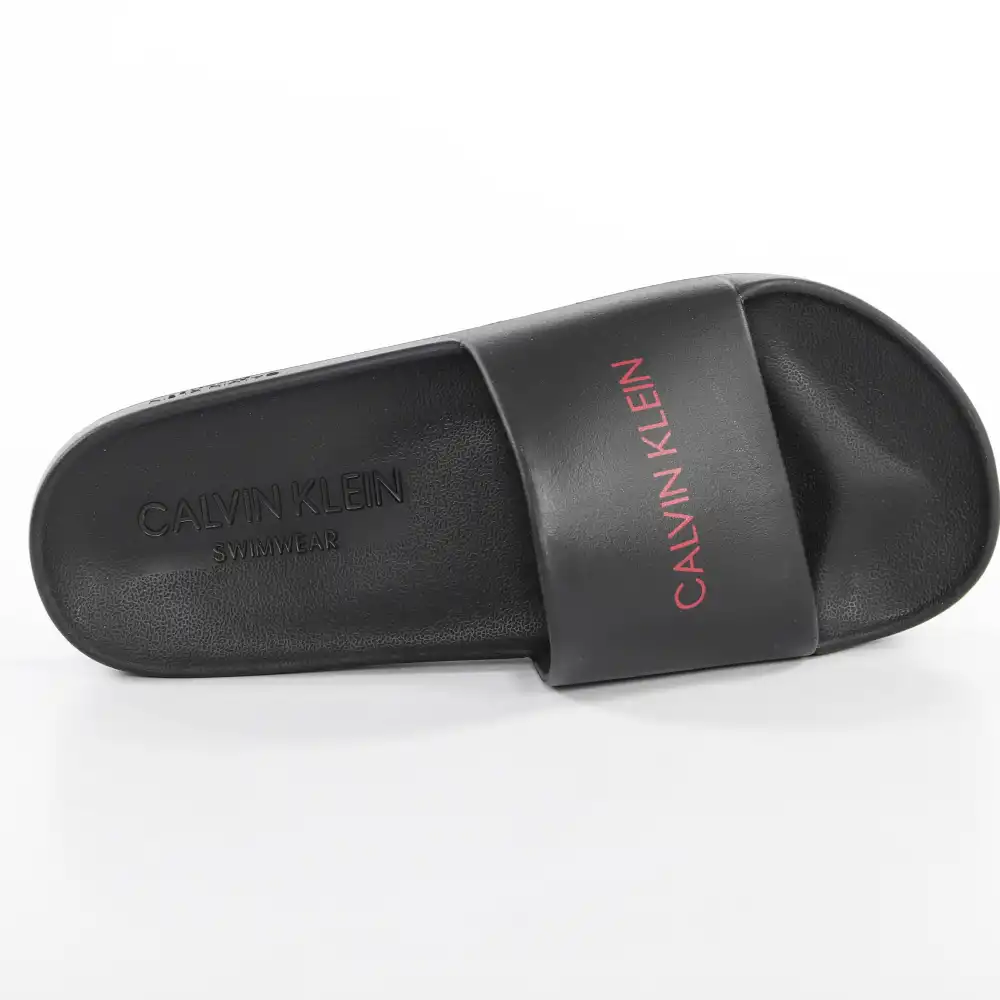 Claquette homme Calvin Klein Slide Noir - ZESHOES Claquette homme Calvin Klein Slide Noir - ZESHOES