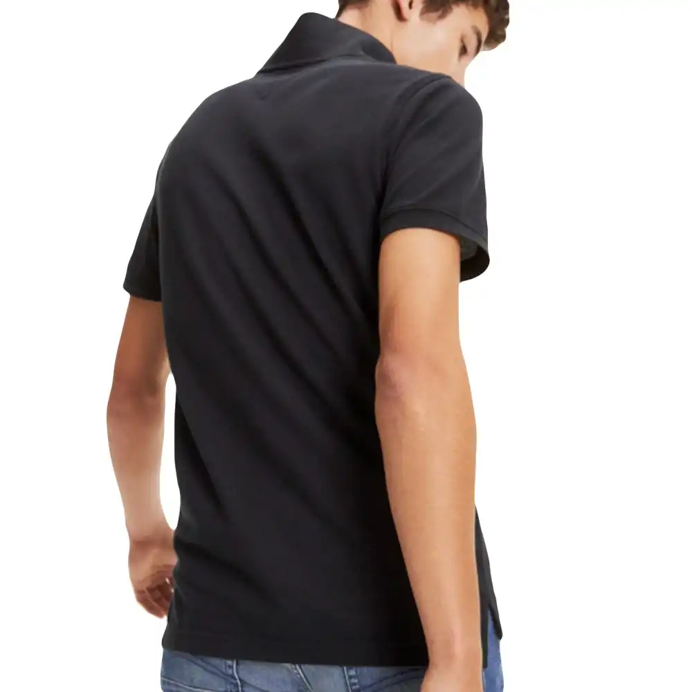 Polo manche courte Tommy Jeans Piqué ajusté Noir - ZESHOES